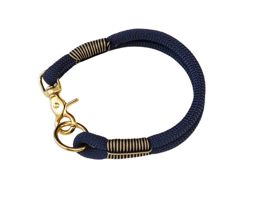 Navy blue Rope Dog Collar with gold accents on a white background