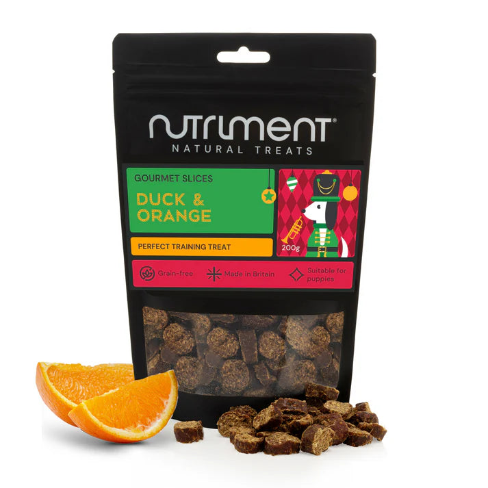 Nutriment duck and orange treats packaging with visible treats and oranges on a white background
