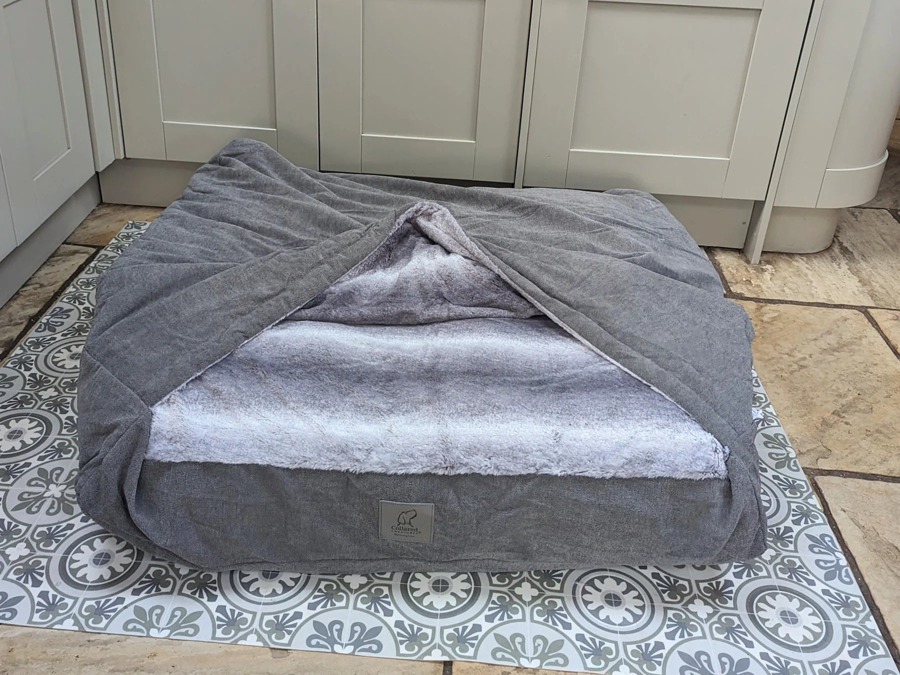 Faux fur lined grey snuggle sack dog bed