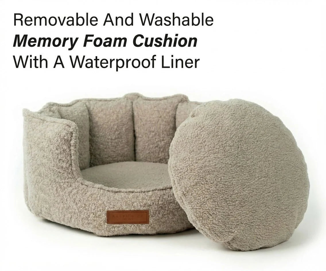 Beige pet bed with round cushion and text about removable and washable memory foam cushion with waterproof liner.