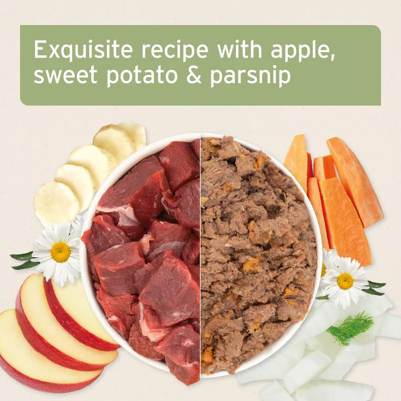 Dog food ingredients including meat, apples, sweet potatoes, and parsnips on a white background with text 'Exquisite recipe with apple, sweet potato & parsnip'.