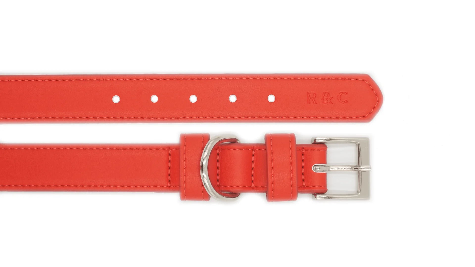 A bright red leather watch strap shown from two angles: one displaying the interior with pre-drilled holes and an embossed 'R&C' logo, and the other showing the exterior with a silver-tone buckle and metal loop.